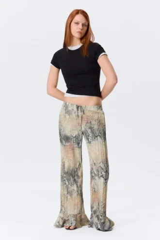 Pantalones holgados de talle medio con volantes – Beige – Estampado de piel de serpiente