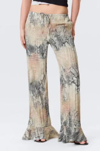 Pantalones holgados de talle medio con volantes – Beige – Estampado de piel de serpiente
