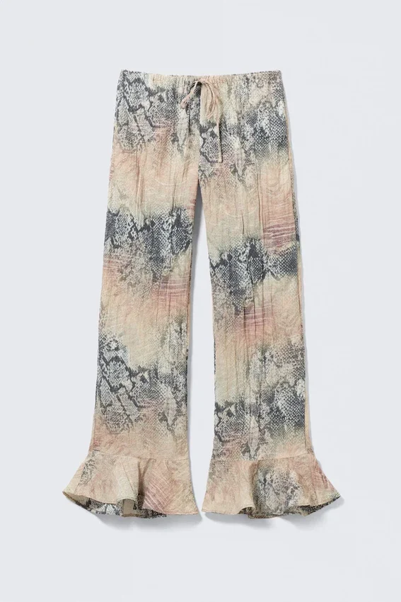 Pantalones holgados de talle medio con volantes – Beige – Estampado de piel de serpiente Pantalones holgados de talle medio con volantes – Beige – Estampado de piel de serpiente