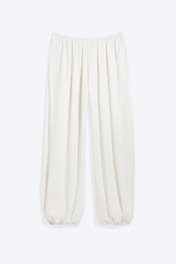 Pantalones holgados de talle medio y corte acampanado – Blanco Pantalones holgados de talle medio y corte acampanado – Blanco