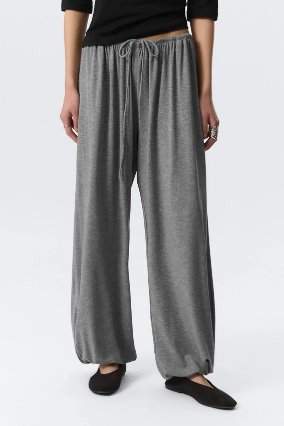 Pantalones holgados de talle medio y corte acampanado – Gris jaspeado Pantalones holgados de talle medio y corte acampanado – Gris jaspeado