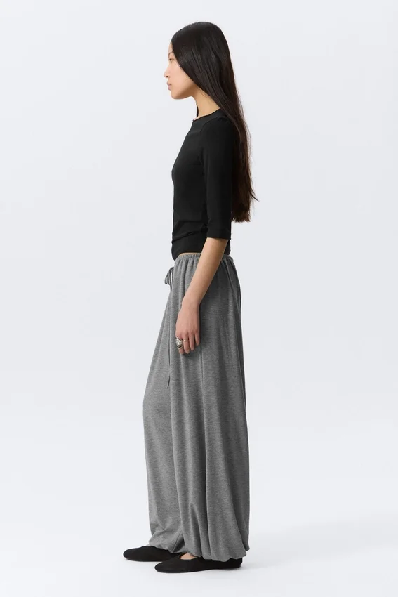Pantalones holgados de talle medio y corte acampanado – Gris jaspeado Pantalones holgados de talle medio y corte acampanado – Gris jaspeado