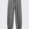 Pantalones holgados de talle medio y corte acampanado – Gris jaspeado Pantalones holgados de talle medio y corte acampanado – Gris jaspeado