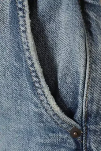 Pantalones joggers de denim de talle bajo y corte holgado – Azul desgastado – Azul medio