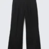 Pantalones Moe de corte holgado y cintura baja – Negro Pantalones Moe de corte holgado y cintura baja – Negro