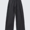 Pantalones vaqueros holgados con pliegues Astro – Índigo crudo – Azul oscuro