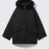 Parka bomber acolchada con ribete de piel sintética – Negro
