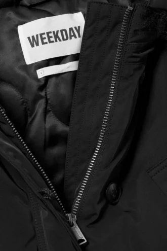 Parka bomber acolchada con ribete de piel sintética – Negro