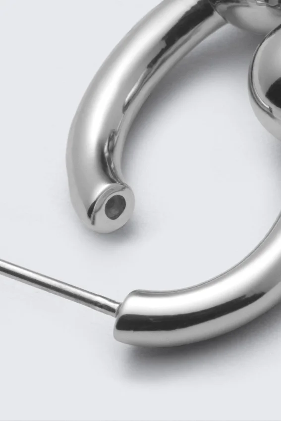 Pendientes de aro esculturales con extremos abiertos – Plata Pendientes de aro esculturales con extremos abiertos – Plata