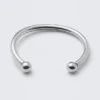 Pulsera tipo brazalete abierta pulida – Plata Pulsera tipo brazalete abierta pulida – Plata