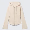 Sudadera con capucha ajustada y cremallera – Crema empolvado Sudadera con capucha ajustada y cremallera – Crema empolvado