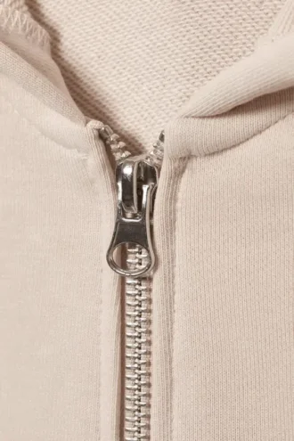 Sudadera con capucha ajustada y cremallera – Crema empolvado