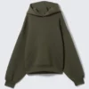 Sudadera con capucha oversize de tejido scuba – Verde caqui oscuro Sudadera con capucha oversize de tejido scuba – Verde caqui oscuro
