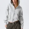 Sudadera con capucha y cremallera, corte recto y largo corto – Gris jaspeado