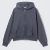 Sudadera con capucha y cremallera de corte holgado – Azul lavado Sudadera con capucha y cremallera de corte holgado – Azul lavado