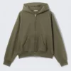 Sudadera con capucha y cremallera de corte holgado – Verde oscuro lavado Sudadera con capucha y cremallera de corte holgado – Verde oscuro lavado
