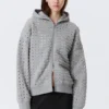 Sudadera con capucha y cremallera de corte recto y corte a láser – Gris jaspeado Sudadera con capucha y cremallera de corte recto y corte a láser – Gris jaspeado