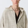 Sudadera con capucha y cremallera de punto texturado de corte recto – Beige claro estampado Sudadera con capucha y cremallera de punto texturado de corte recto – Beige claro estampado