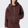 Sudadera con capucha y cremallera oversize de neopreno – Burdeos