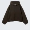 Sudadera con capucha y cremallera oversize de neopreno – Marrón oscuro Sudadera con capucha y cremallera oversize de neopreno – Marrón oscuro