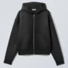 Sudadera con capucha y cremallera Simon Washed Scuba – Negro descolorido Sudadera con capucha y cremallera Simon Washed Scuba – Negro descolorido