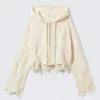 Sudadera corta con capucha y cremallera de punto calado – Blanco roto Sudadera corta con capucha y cremallera de punto calado – Blanco roto