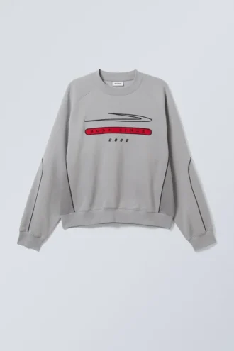 Sudadera raglán regular con estampados – Bold Since 2002
