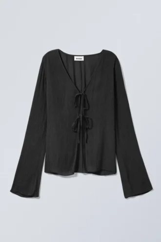 Top ajustado con lazo – Negro