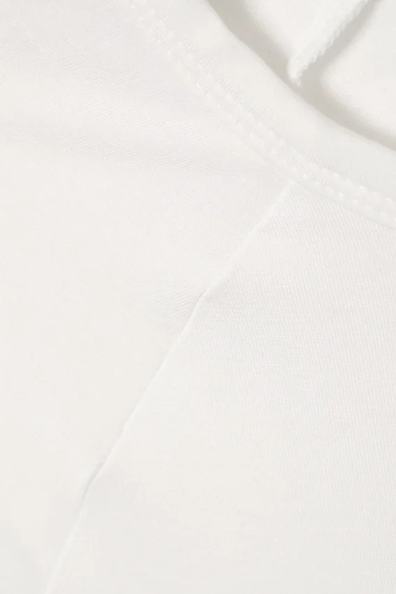 Top ajustado con mangas raglán – Blanco Top ajustado con mangas raglán – Blanco