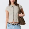 Top ajustado de manga corta con cremallera – Beige Top ajustado de manga corta con cremallera – Beige