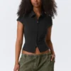 Top ajustado de manga corta con cremallera – Negro Top ajustado de manga corta con cremallera – Negro