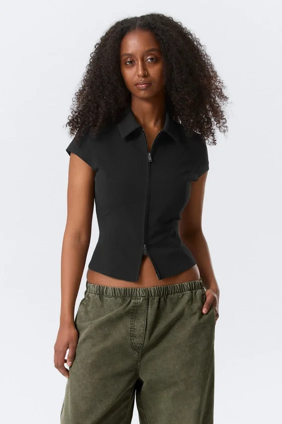 Top ajustado de manga corta con cremallera – Negro Top ajustado de manga corta con cremallera – Negro