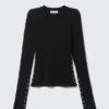 Top ajustado de manga larga con botones a presión – Negro Top ajustado de manga larga con botones a presión – Negro
