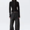 Top ajustado de manga larga con cuello alto y cremallera – Negro Top ajustado de manga larga con cuello alto y cremallera – Negro