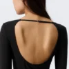 Top ajustado de manga larga con espalda abierta – Negro Top ajustado de manga larga con espalda abierta – Negro