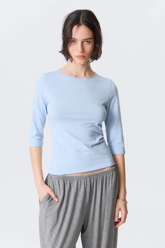 Top ajustado de manga tres cuartos – Azul claro Top ajustado de manga tres cuartos – Azul claro