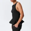 Top ajustado de nailon con peplum – Negro Top ajustado de nailon con peplum – Negro