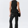 Top ajustado de nailon con peplum – Negro Top ajustado de nailon con peplum – Negro