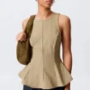 Top ajustado de nylon con peplum – Beige Top ajustado de nylon con peplum – Beige