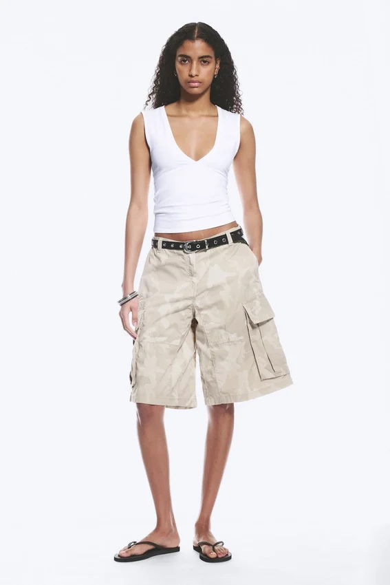 Top ajustado sin mangas con cuello en V – Blanco Top ajustado sin mangas con cuello en V – Blanco