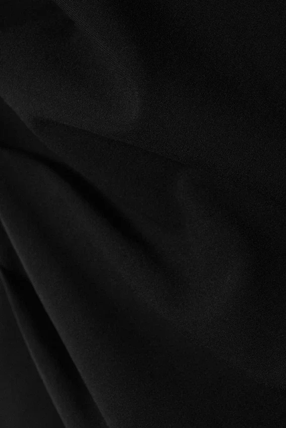 Top asimétrico sin mangas de sarga – Negro Top asimétrico sin mangas de sarga – Negro