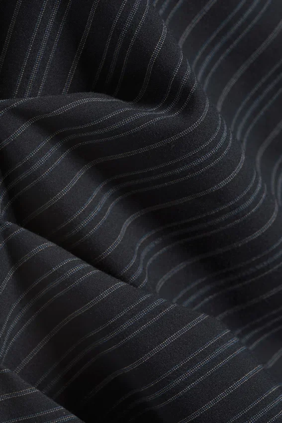 Top asimétrico sin mangas de traje – Azul oscuro Top asimétrico sin mangas de traje – Azul oscuro