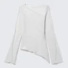 Top asimétrico transparente con cuello barco – Beige claro Top asimétrico transparente con cuello barco – Beige claro