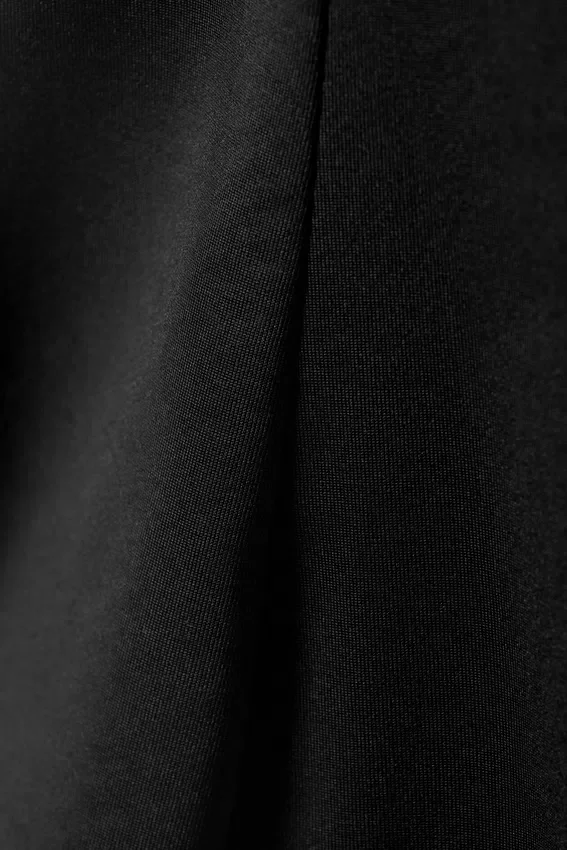Top con cuello barco y volantes – Negro Top con cuello barco y volantes – Negro