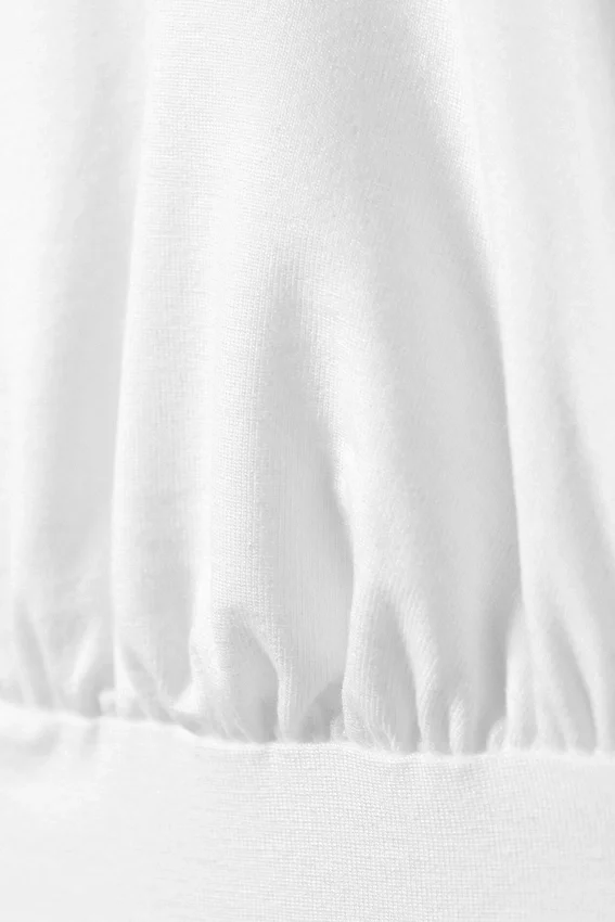 Top con cuello halter profundo – Blanco Top con cuello halter profundo – Blanco