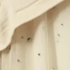 Top con mangas de malla con pedrería – Beige Top con mangas de malla con pedrería – Beige