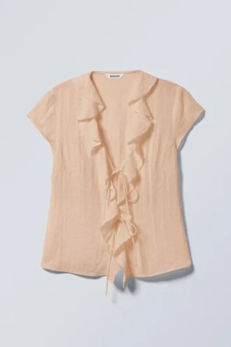 Top con volantes y lazo delantero – Beige
