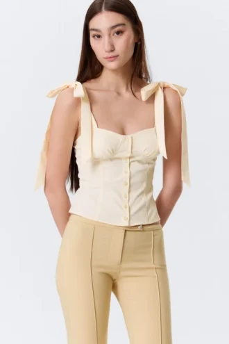 Top corsé ajustado con lazo – Blanco roto