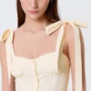 Top corsé ajustado con lazo – Blanco roto
