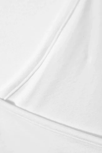 Top cruzado de manga larga y corte entallado – Blanco